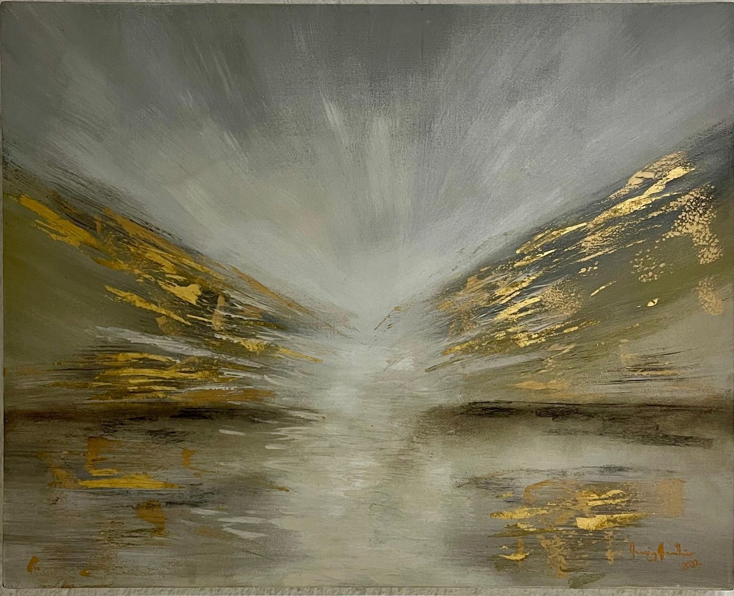 Sundown: paisaje gris con hoja de oro